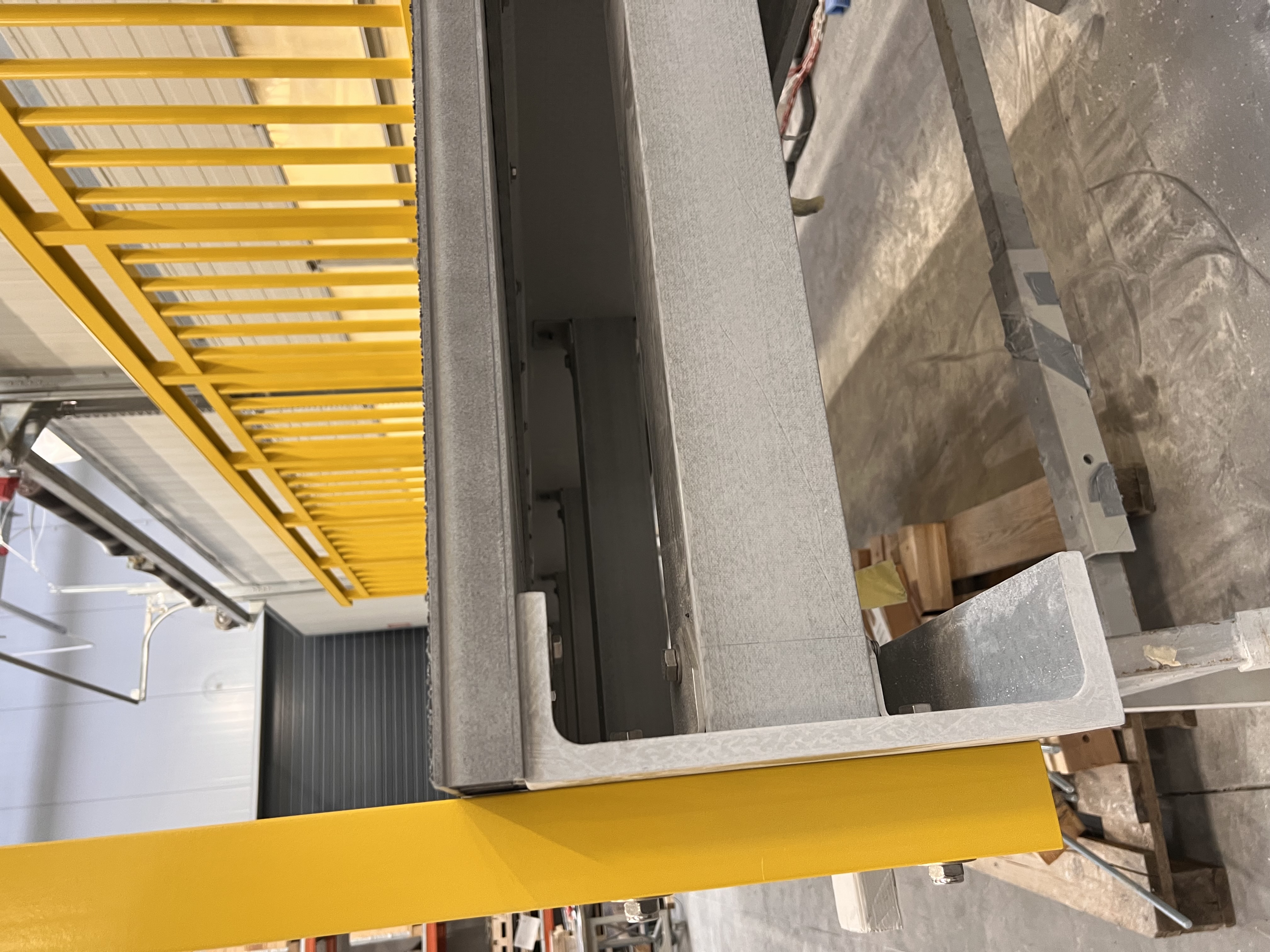 Yellow GRP square tube used as a baluster in a Fiberline handrail system